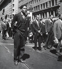 John Gutmann  -  Black Man Alone. Union Members Funeral Procession for Killed Workers. General Strike, San Francisco, 1934 /   -  11x14 